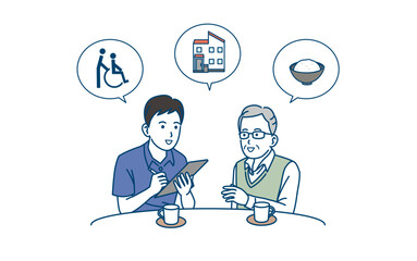 高齢者と相談をする介護士の男性