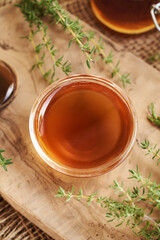 A bowl of herbal thyme syrup