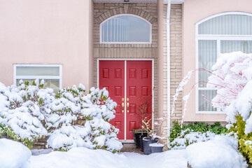 Entrance of grey painted luxury house with nice landscape at winter in Vancouver, Canada, North...