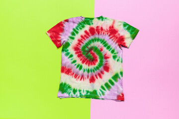 Colorful Tie-Dye T-Shirt on Bright Two-Tone Background