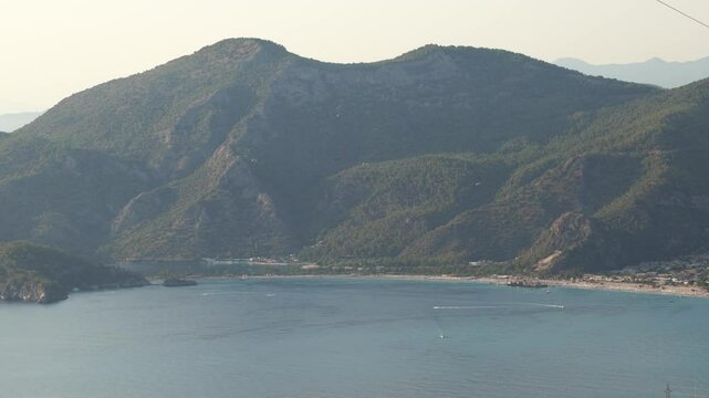 Panoramic view of Oludeniz from the Butterfly Valley road with the hills in the background.