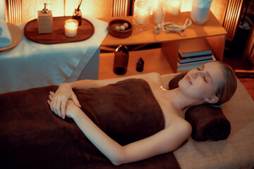 Caucasian woman customer enjoying relaxing anti-stress spa massage and pampering with beauty skin...
