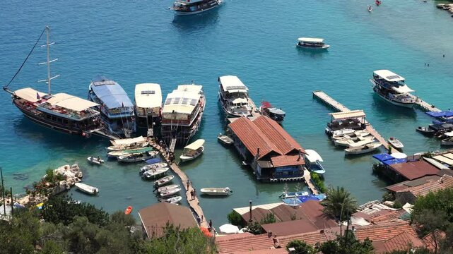 View over Kalekoy village and ruins of the Simena castle, with Kekova island across the water, in Antalya province of Turkey.