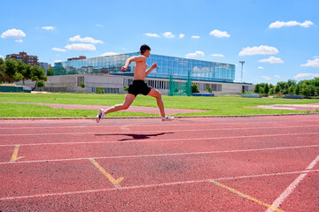 Sprinter mid-stride during track training