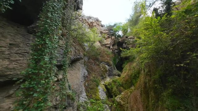 Drone view at Hotnishki Waterfall near Veliko Tarnovo during summer with great acqua colors