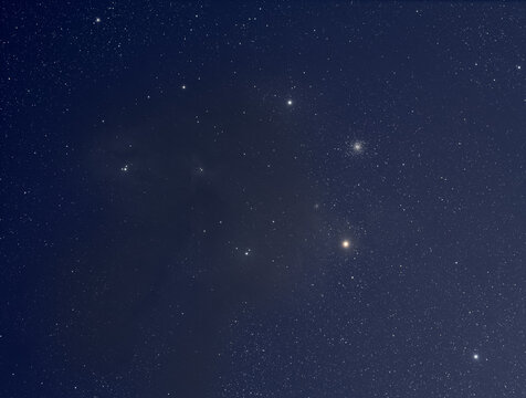 A dark nebula and bright stars in the night sky - Powered by Adobe