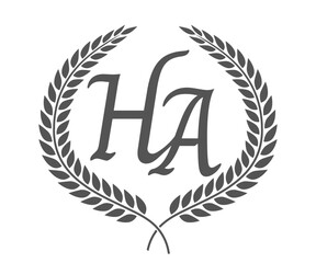 Initial letter H and A, HA monogram logo design with laurel wreath. Luxury calligraphy font.
