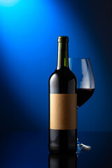 Bottle of red wine with old empty label.