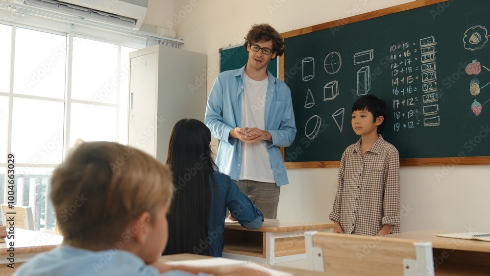 Aufkleber student standing at in front of class and start to introduce himself at classroom while caucasian te
