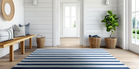 Nautical blue and white striped area rug in coastal entryway with nautical decor, farmhouse home interior design of modern entrance hall