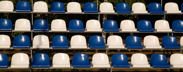 Fototapeta premium Plastic multicolored stadium seats.