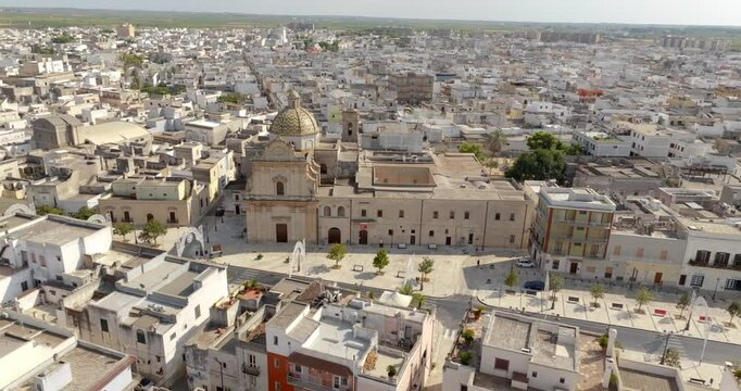 Aerial view of the Church of Santa Maria di Costantinopoli located in Manduria, in the province of Taranto, Italy. It is located in the main street of the city. It has a neoclassical facade.