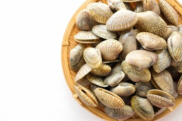 Close up Fresh clams in white ceramic on white background