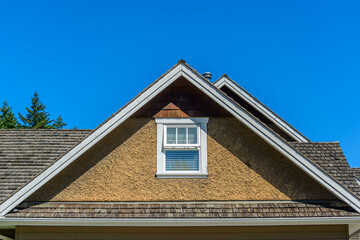 The top of the house with nice window in Vancouver, Canada.