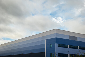 Industrial distribution warehouse construction frame in england uk sunset