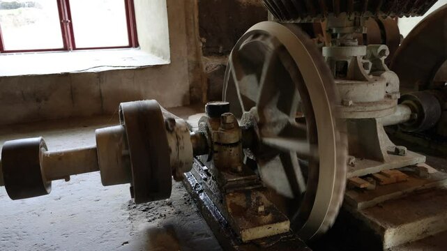 Inside an old retro mill. Still functional. Creating flour. Kvarnvikens kvarn, Stockholm, Sweden. September 2024.