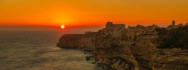 Bonfifacio on the island corsica, france - sunset over the sea