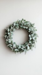 Minimalist Eucalyptus and Pine Wreath on Plain Background - Modern Holiday Decoration
