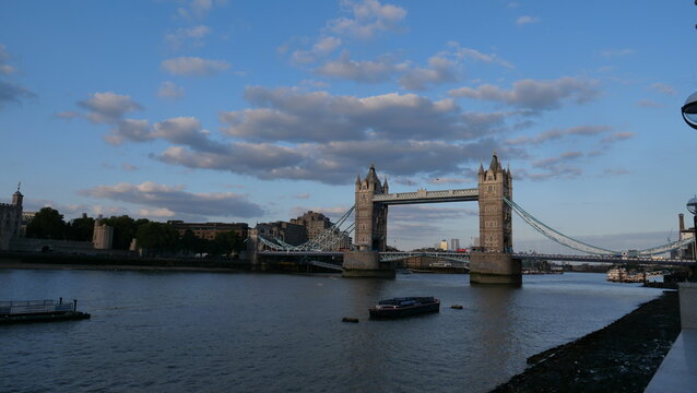View of Tower Bridge in London, spanning the River Thames. Showcasing the iconic bridge's stunning Gothic architecture and its prominent role in the city's skyline