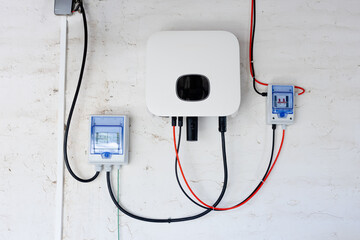 connection of a residential photovoltaic inverter with DC and AC surge protections 