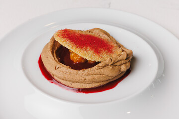 Beautiful presentation of pate with fruit sauce.