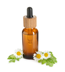 Bottle of tincture and daisy flowers isolated on white