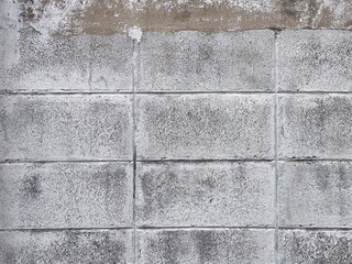 Old white concrete wall texture. Grunge cement wall background. Cement surface. Retro style background for backdrop and design with copy space. Idea for exterior or interior design and decoration