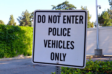 Do Not Enter Police Vehicles Only, Authorized Personnel Only signs