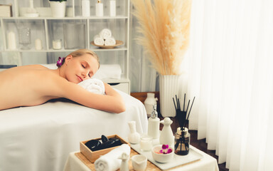 Caucasian woman customer enjoying relaxing anti-stress spa massage and pampering with beauty skin...
