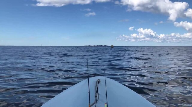 the bow of the boat is swinging, sailing