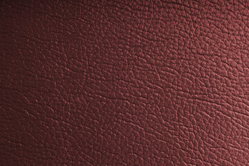 Natural, genuine red leather with metallic effect, texture of glossy leatherette background