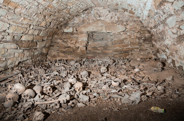 Mysterious Underground Crypt Filled with Ancient Human Remains and Stone Architecture