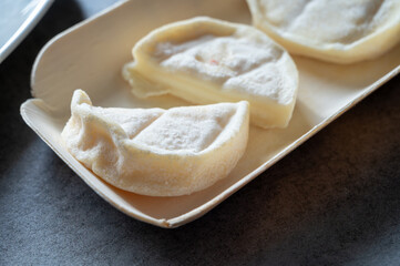 Rocamadour or cabecous soft goat AOC cheese with soft rind produced on farm in Perigord and Quercy on farmers market, departement Lot, France