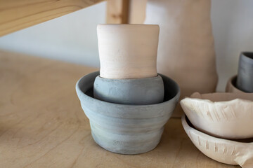 Samples of ceramic art objects and tabelware during workshop in art ceramic atelier in Poland