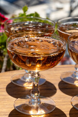 Summer party, French brut rose champagne sparkling wine in coupe glasses in yacht harbour of Port Grimaud near Saint-Tropez, French Riviera vacation, Var, France