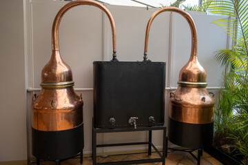 Copper distillation tanks, classic perfume production from natural ingredients in Provence, perfume factory in Grass or Eze, French riviera