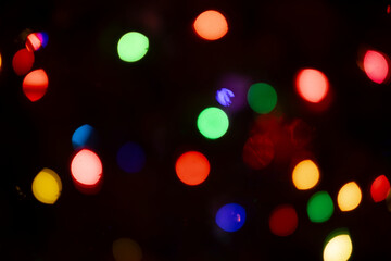 Colorful Swirling Lenticular Bokeh Balls of Christmas Tree Lights Decoration for Festive Holiday Season