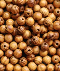 Brown wooden beads, closeup photo