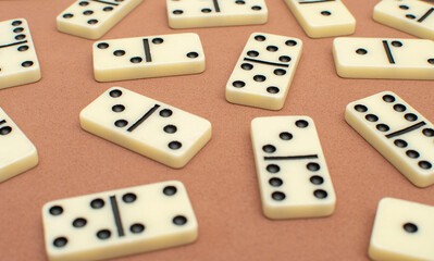 Dominoes bones on brown background	