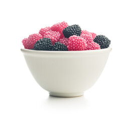 Sweet jelly candies in bowl isolated on white background.