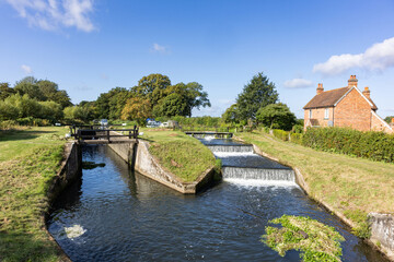 View of historic 17th century Papercourt lock and overspill weir located close to Ripley and Pyrford near to Guildford in Surrey