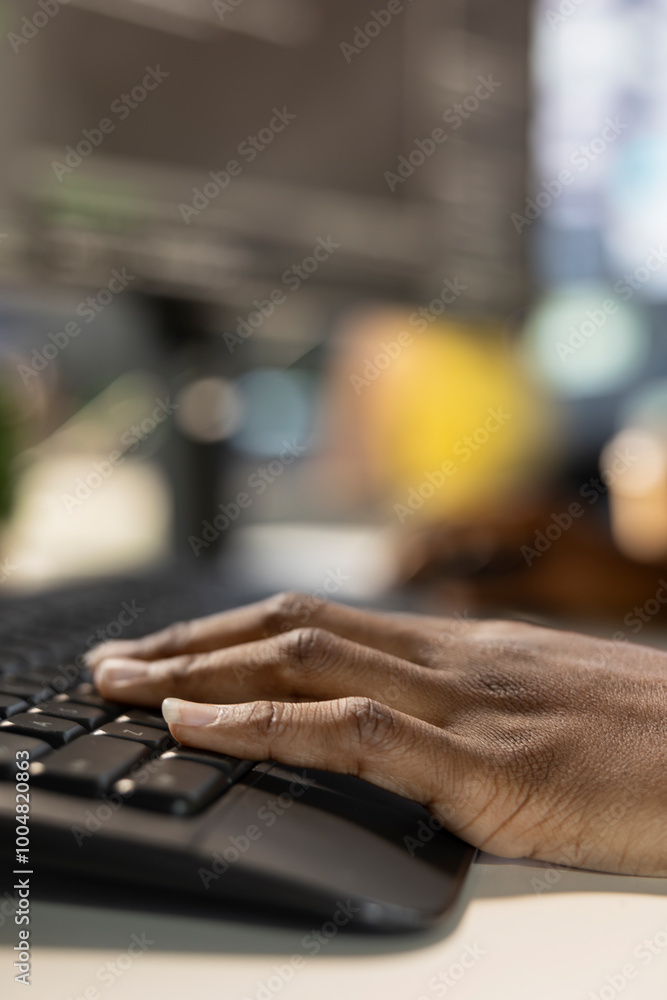 Poster employee on computer writing emails, solving tasks. close up of bookkeeper typing on keyboard in off