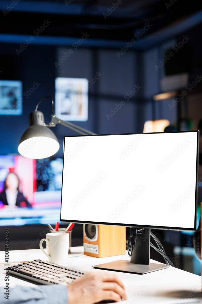 Poster remote worker looking at white template on pc monitor, sitting at home and using empty computer layo