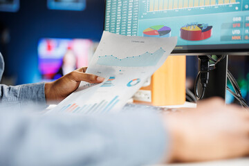 African american consultant studying constitutional balance records and expenditure figures for...