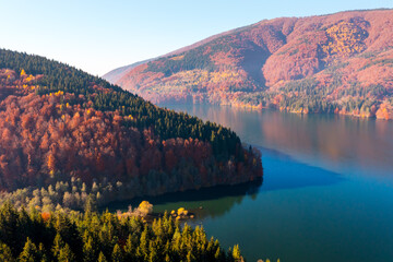 A magical view of the lake surrounded by mountains from a height. Carpathian mountains, Ukraine, Europe.