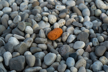 Processed collage of sea shore pebbles texture. Background for banner, backdrop or texture for 3D mapping
