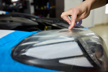 Applying a Protective Film on Your Cars Headlight for Enhanced Longevity and Safety