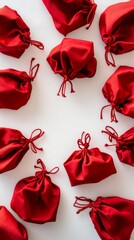 Red drawstring bags on white background, festive