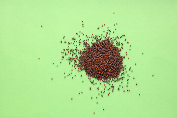 Brassica juncea - Pile of brown mustard seeds.