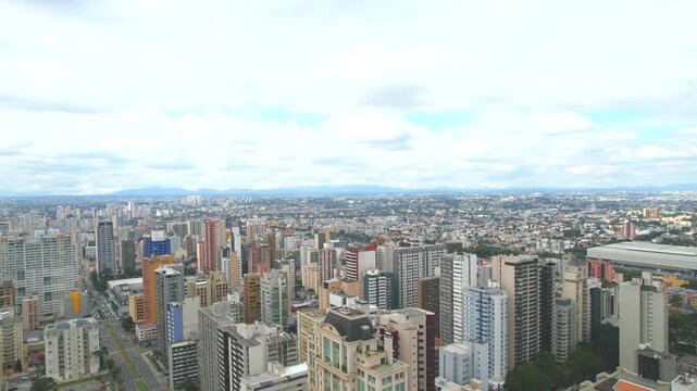 Center of the Batel neighborhood, in the city of Curitiba, state of Paran&aacute;, southern Brazil, aerial drone tour between the buildings